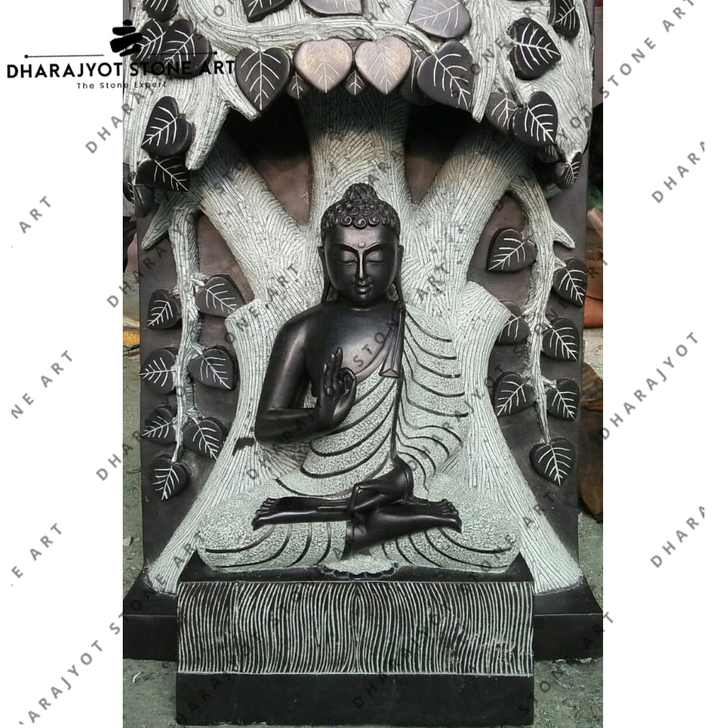 Black Marble Buddha Statue Under The Tree