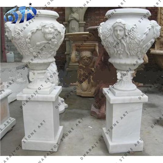 A Pair of Hand Carved White Marble Finials