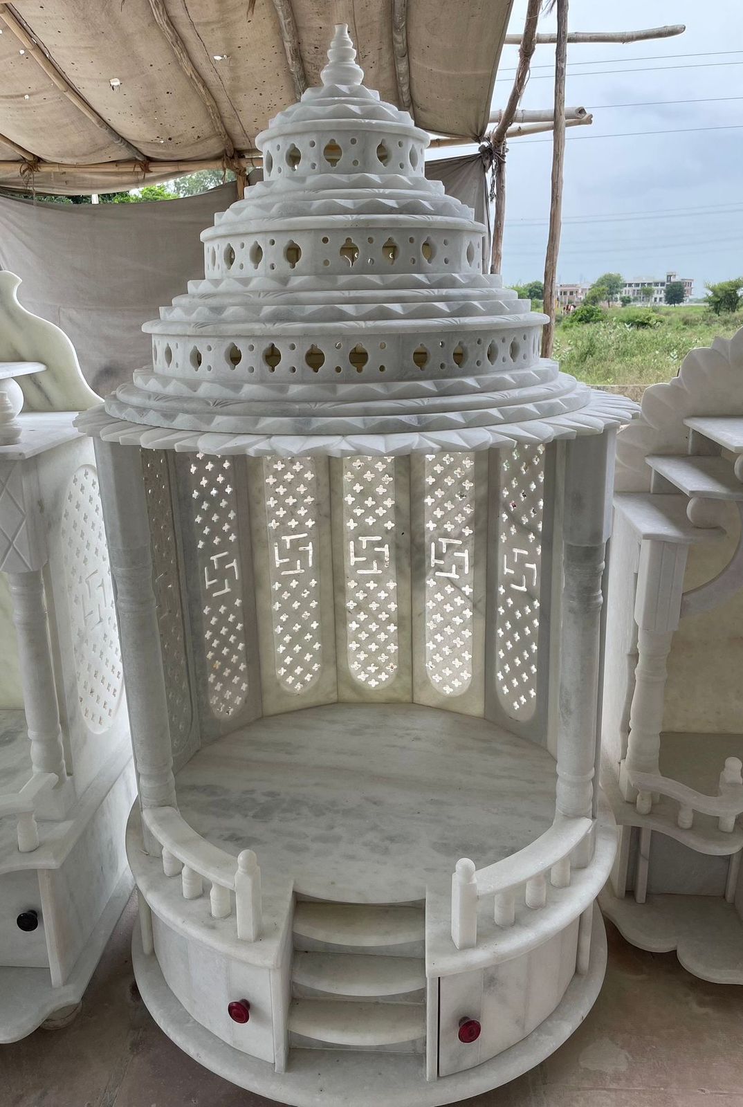 Elegant White Marble Swastik Jali Work and Steps Hand-Carved Temple