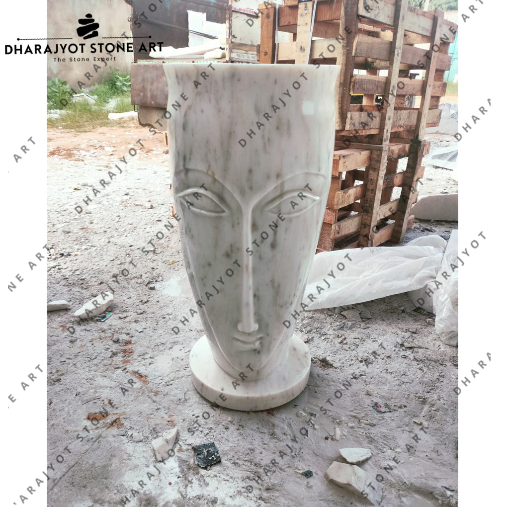 Hand-Carved Marble Face Sculpture Reflecting Minimalist Modern Art